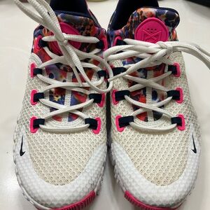 Nike women’s Sneakers with Pink and White Design
